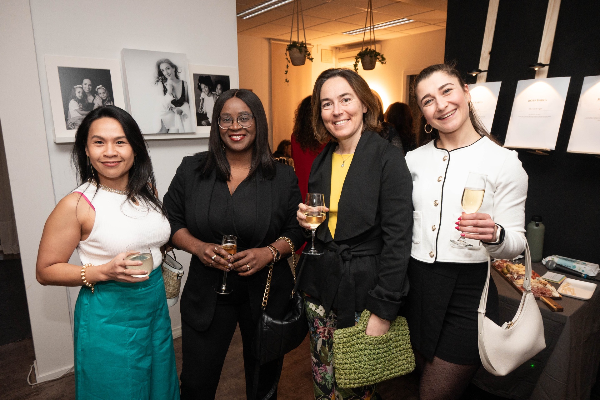 Four Boss Babes celebrating together at the gallery