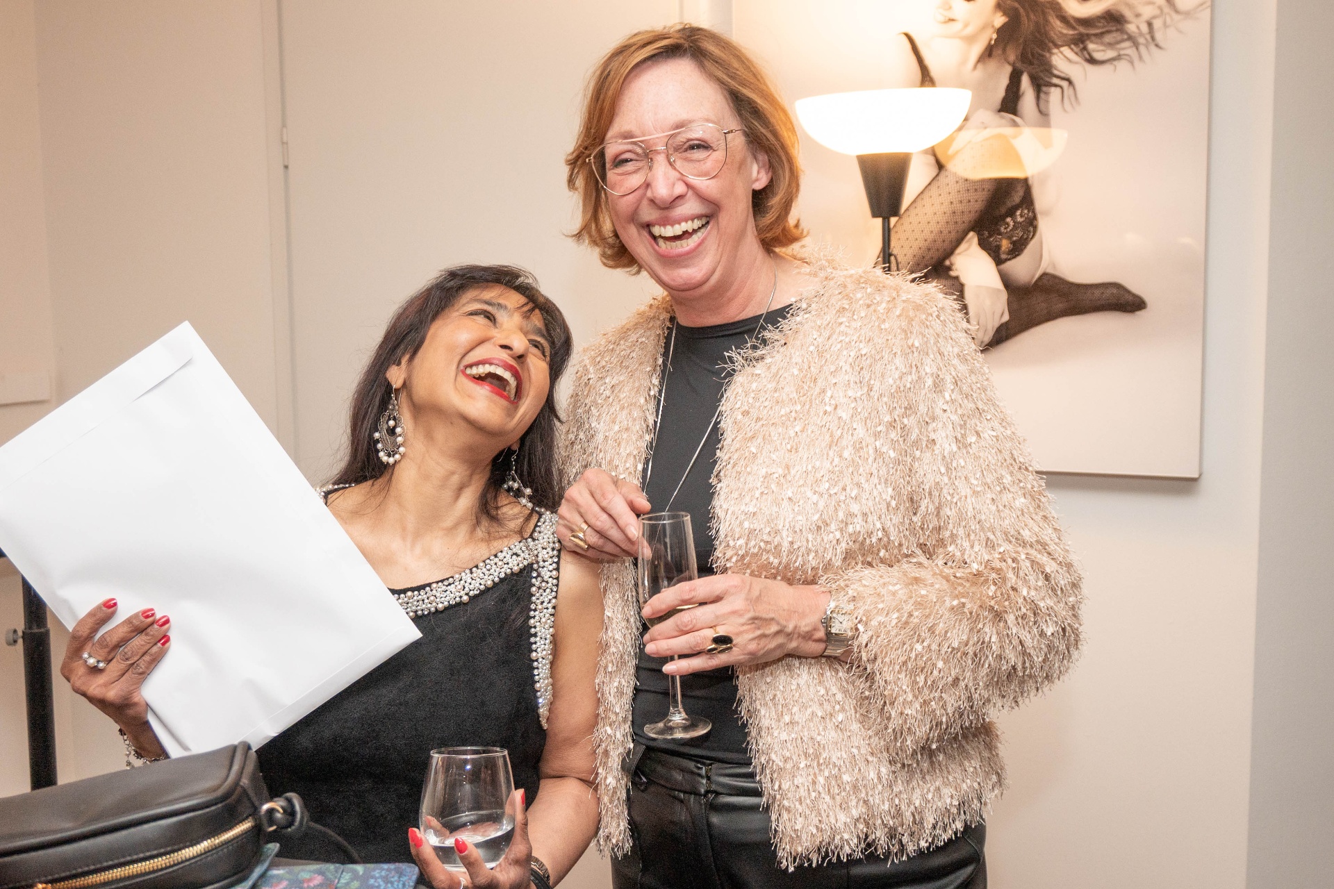 Two Boss Babes laughing together at the event