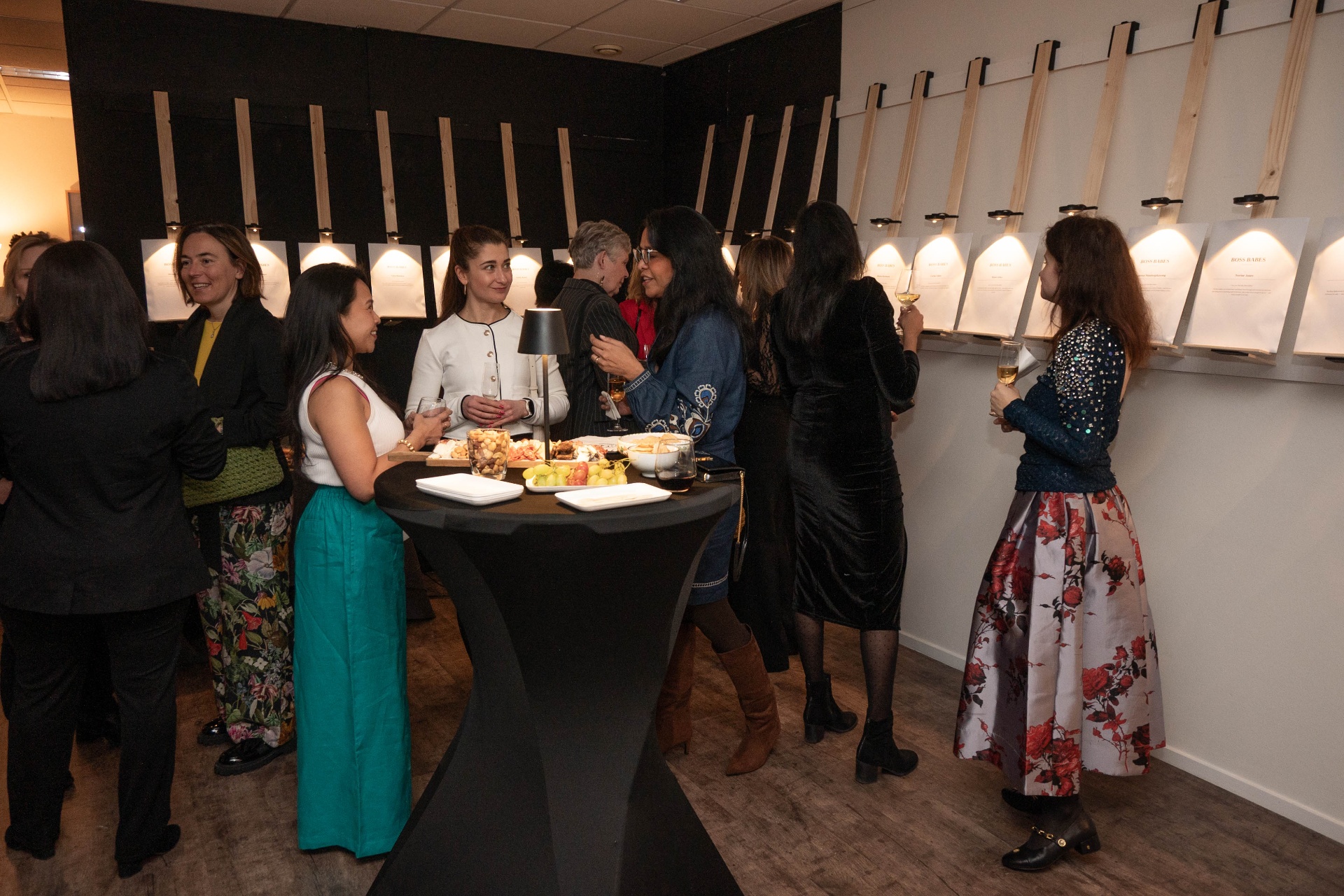 Guests mingling at the magazine reveal gallery