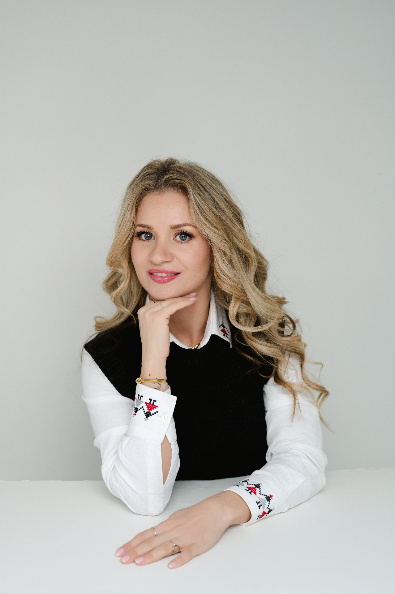Boss Babe portrait — Bettina in embroidered blouse