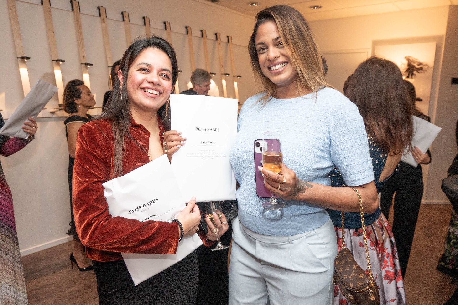 Boss Babes holding their personalised envelopes